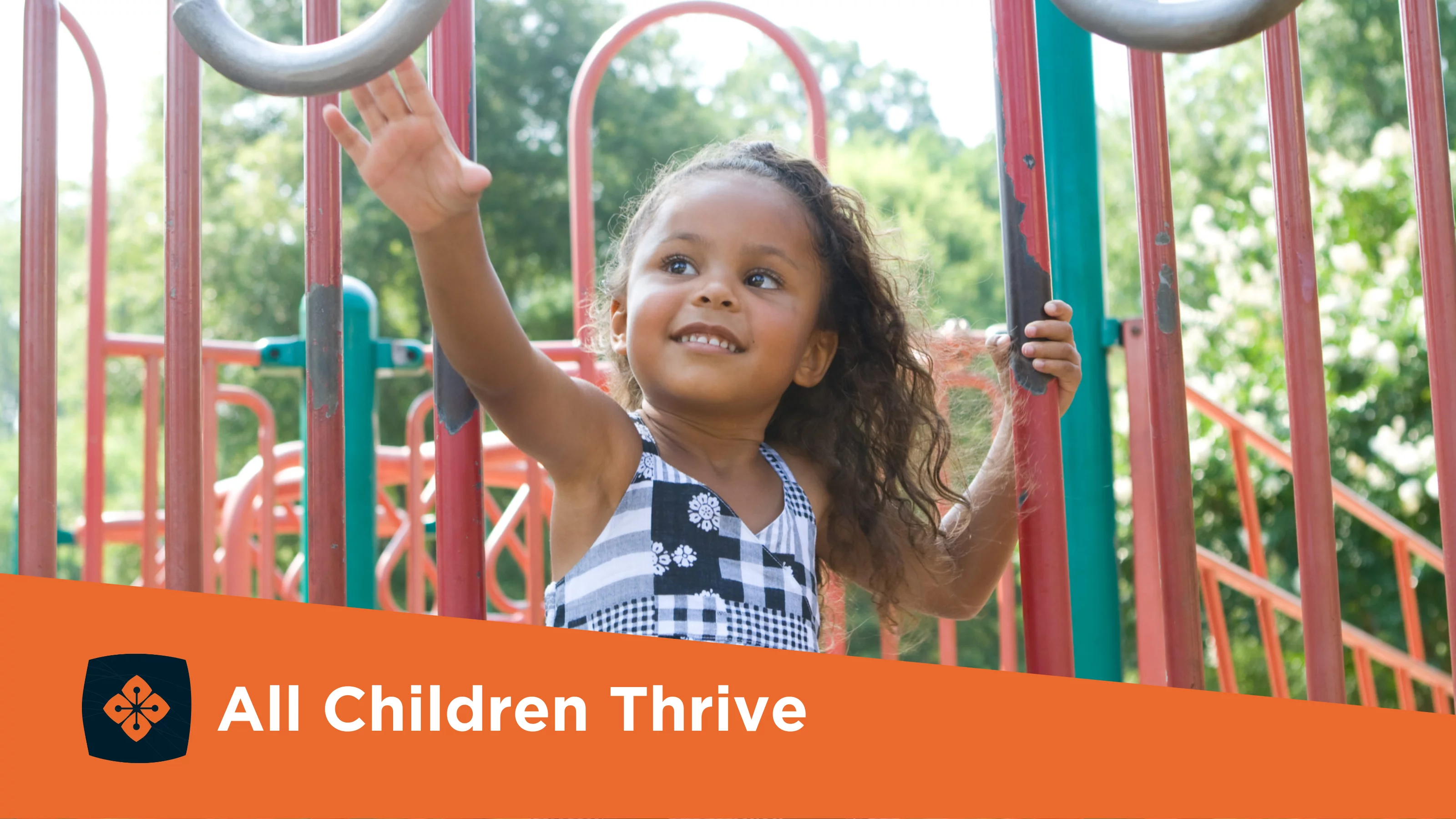 Photograph of young girl playing on a park playground with All Children Thrive logo on the bottom.